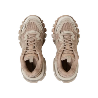 Planet Luxury Brands imzalı, bej renkli, deri detaylı ve kalın tabanlı Balenciaga Track 3 kadın sneaker modeli.
