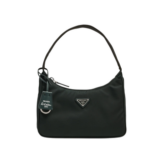 Planet Luxury Brands yeşil Re-Nylon kumaştan üretilmiş, metal logolu ve Re-Edition 2000 etiketli mini omuz çantası.