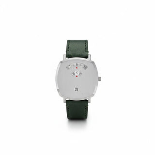 Planet Luxury Brands imzalı, gümüş paslanmaz çelik kasalı ve yeşil deri kayışlı, disk göstergeli Gucci quartz saat.