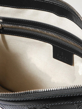 Planet Luxury Brands Gucci siyah kabartmalı deri el çantasının fermuarlı iç bölmesi ve kumaş astar detayı