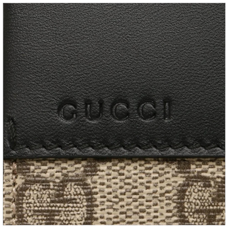 Planet Luxury Brands Gucci deri detaylı kanvas cüzdan üzerinde kabartma logo detayı
