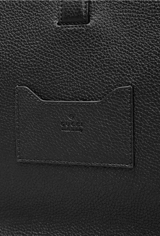 Planet Luxury Brands Gucci siyah deri evrak çantası üzerinde kabartmalı logo detayı