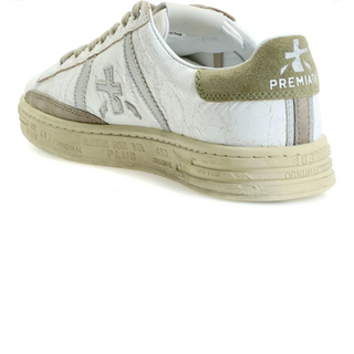 Planet Luxury Brands Premiata Russell krem rengi deri erkek sneaker, topuk detaylı ve yazılı tabanlı tasarım