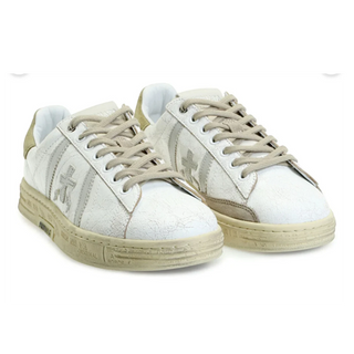 Planet Luxury Brands imzalı, krem rengi, bağcıklı, çatlak deri dokulu ve düz tabanlı Premiata Russell erkek sneaker.