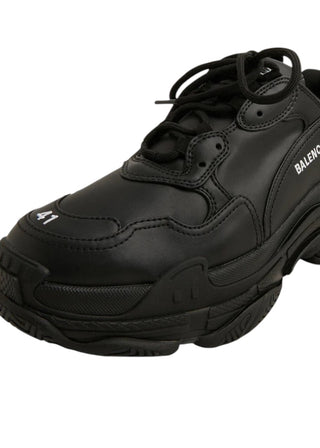 Planet Luxury Brands siyah deri Balenciaga Triple S erkek sneaker, kalın tabanlı ve ikonik tasarım detaylı